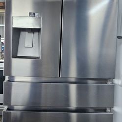 STAINLESS STEEL 4 DOORS REFRIGERATOR WITH ICE MAKER AND WATER DISPENSER ON DOOR.....$ 700