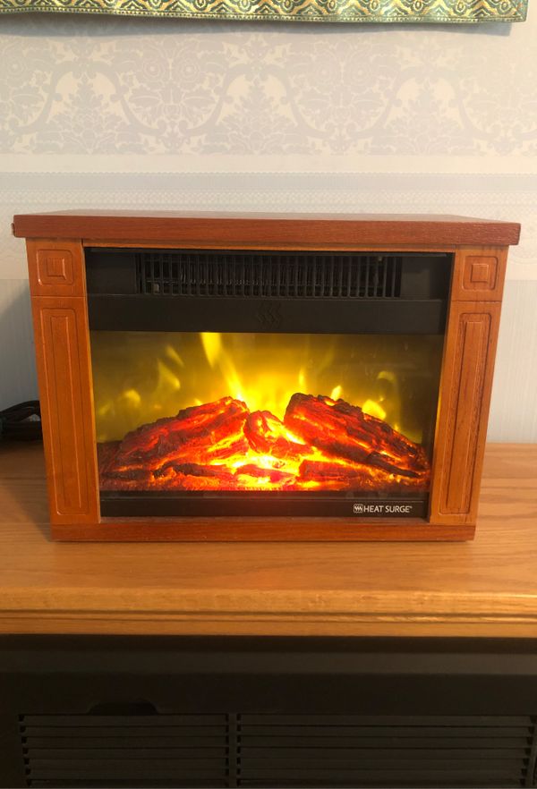 Miniature Decorative Fireplace Heater w/ Remote for Sale in Phoenix, AZ