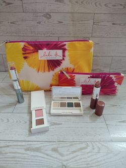 Clinique make up bundle with travel bags