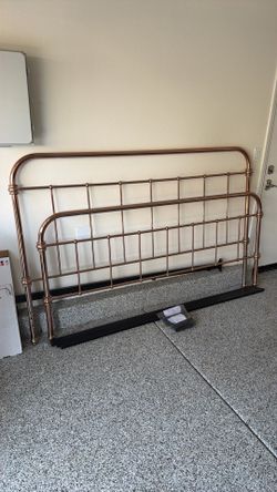 Rose gold king bedframe.