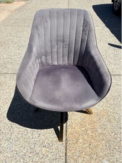 Gray midcentury modern swivel chair