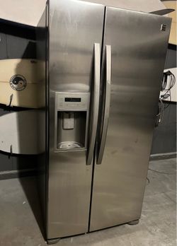 Stainless steel side-by-side refrigerator freezer