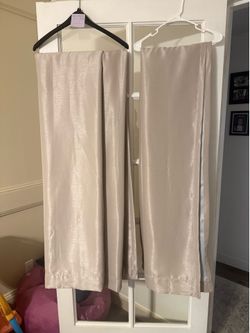 Three blackout Grey Drapes.