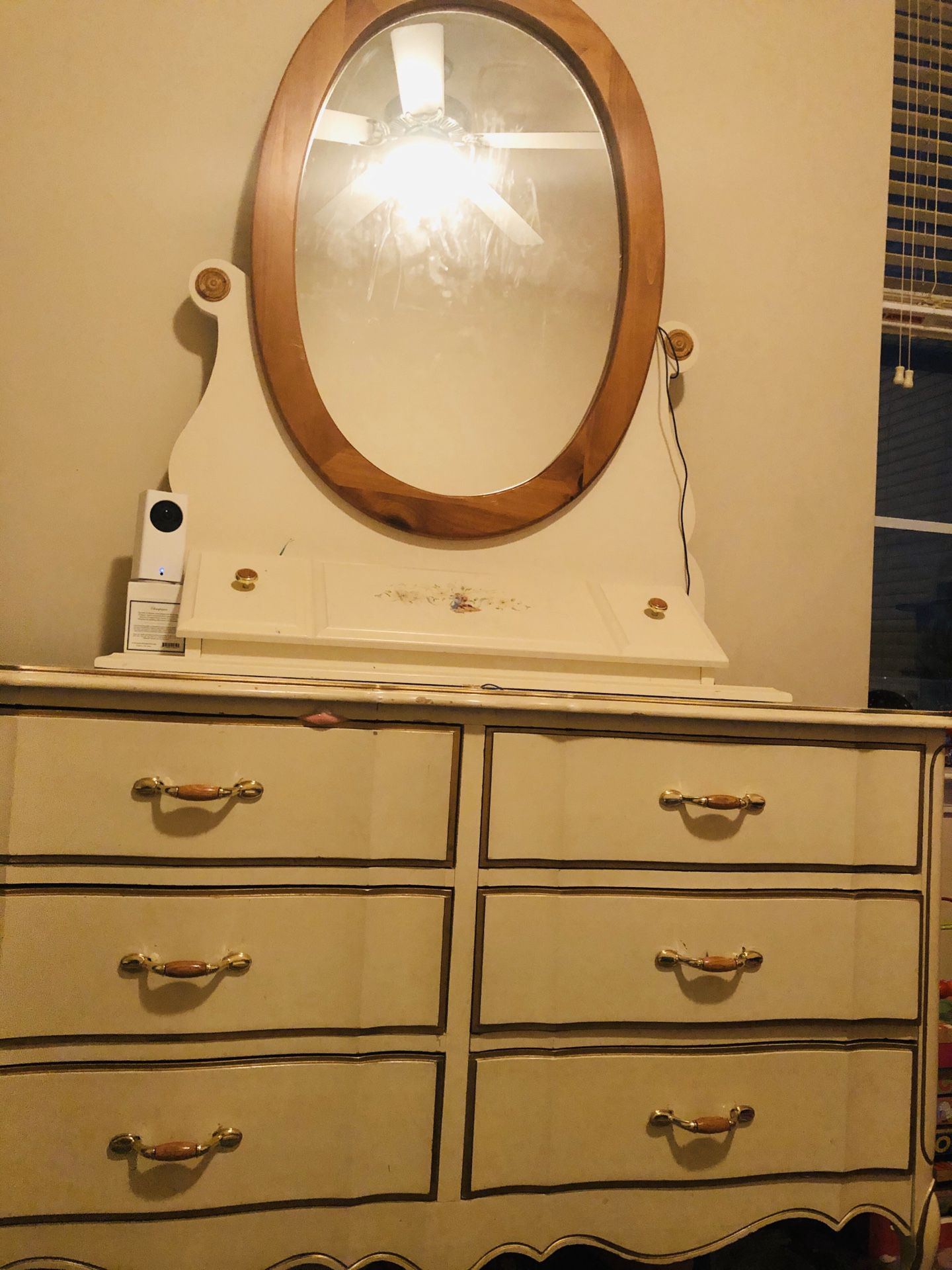Drawer dresser with a mirror