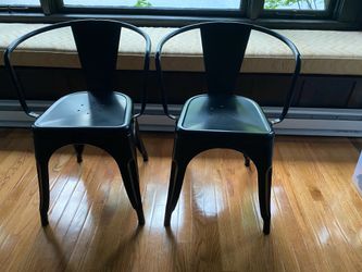 4 black metal dining chairs