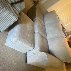 Ashleys Sofa With Ottoman $200