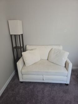White Fabric sleeper Loveseat with Throw Pillows