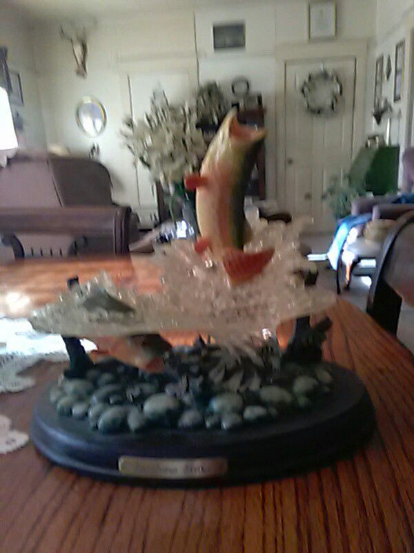 Fish statue. Rainbow Strike.
