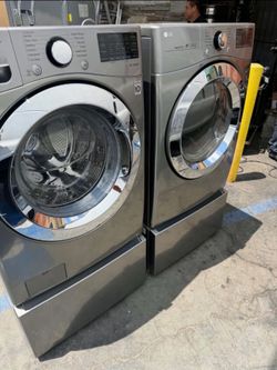 LG stainless steel washer and gas dryer front load with pedestal