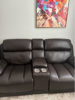 Dark Brown Leather Reclining Loveseat with Console & Cup Holders