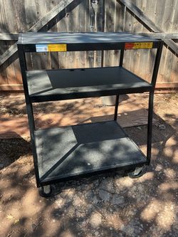 Bretford 3-Shelf Rolling Utility Cart it’s 45 inches tall 36 inches wide and 28 inches deep