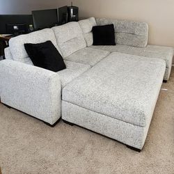 Large White Sectional Couch and Ottoman