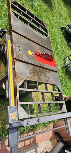 Craftsman metal table saw with wheels.  10" direct drive.