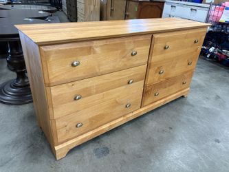Honey Finished 6 Drawer Dresser with Oval Silver Pulls