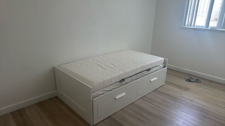 Twin bed with bed frame with storage
