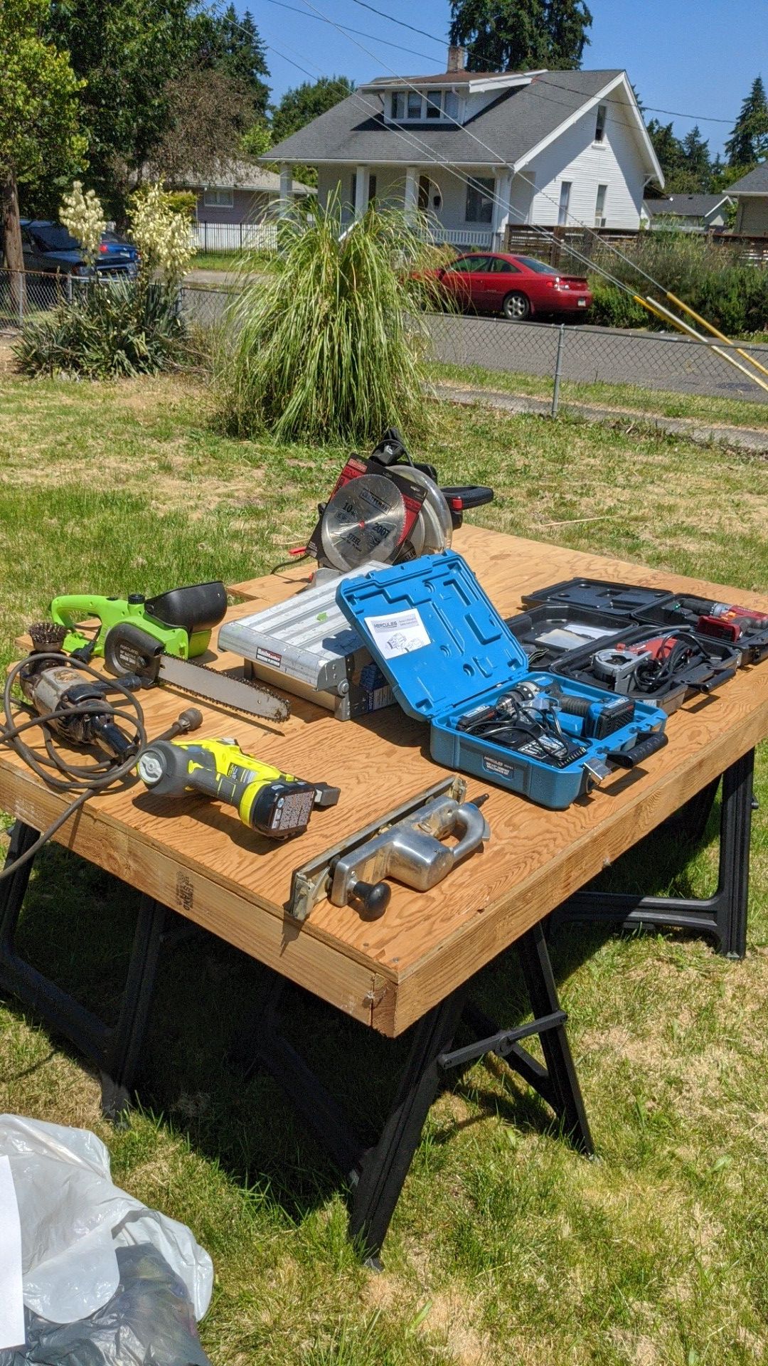 Various power tools + garage full of more