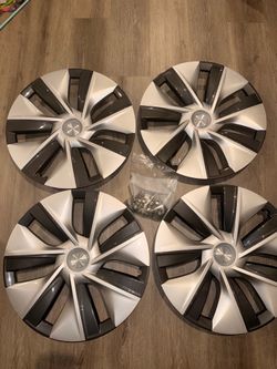 For Sale: Genuine Original Tesla Wheel Covers