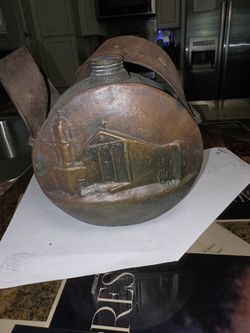 Antique copper canteen.
