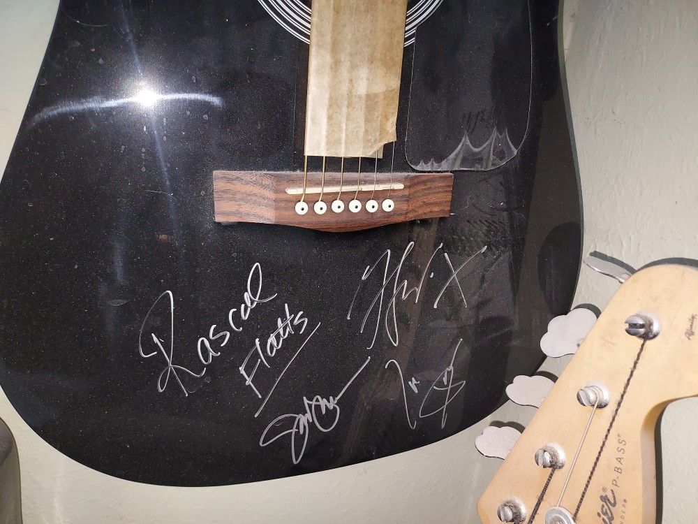 Rascal flats signed Fender acoustic guitar.