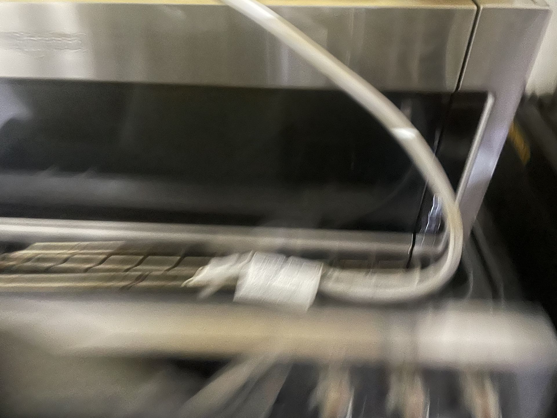 Square microwave sits over stove or anywhere you like