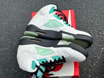 Size 11 Jordan 5 Retro 'Island Green' sneakers, featuring a white leather upper with a tonal leopard