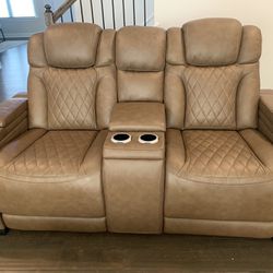 Power recliner with controls and wireless charging.