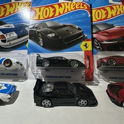 $15 Ferrari set  (DOSE NOT INCLUDE LOOSE CAR)