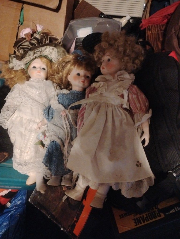 Three Porcelain Dolls