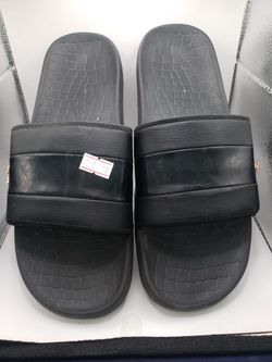 Size: 8, pair of black Lacoste slide sandals.