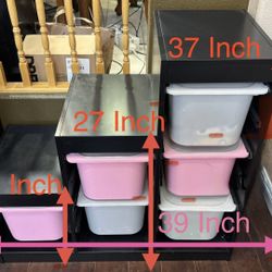 strong and durable modular storage system, perfect for a playroom, kids’ room, office, craft area, or garage. Includes multiple large plastic bins tha