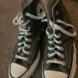 Green high top converse 