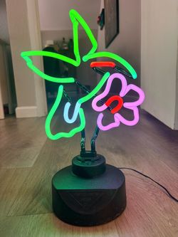 Neon hummingbird sculpture