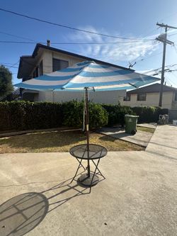 3 piece table and umbrella