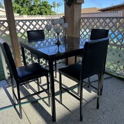Marble dining table with 4 leather chairs