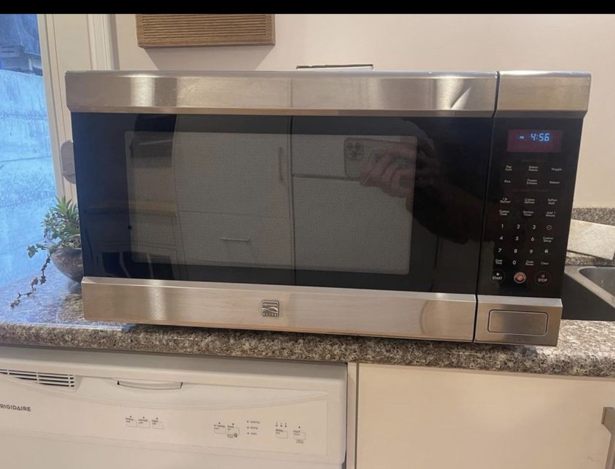 Sold at Auction: KENMORE 1000W UNDER CABINET MICROWAVE