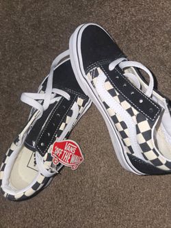 Vans black + white checkered skateboarding trainers. Size US 13.5