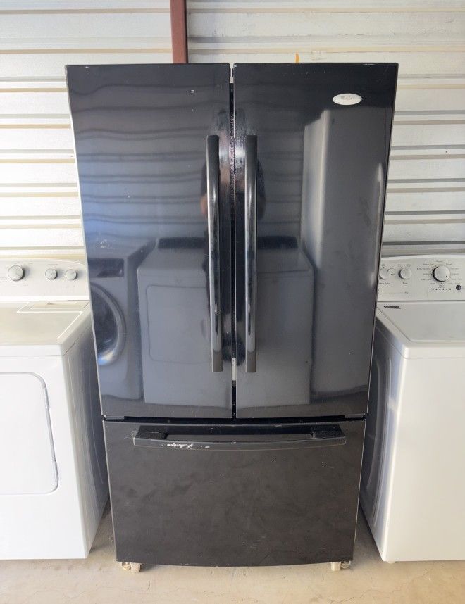Black Whirlpool Refrigerator And Freezer