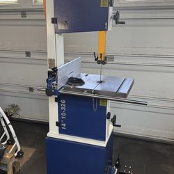 Rikon 10-326 bandsaw on grizzly rolling base