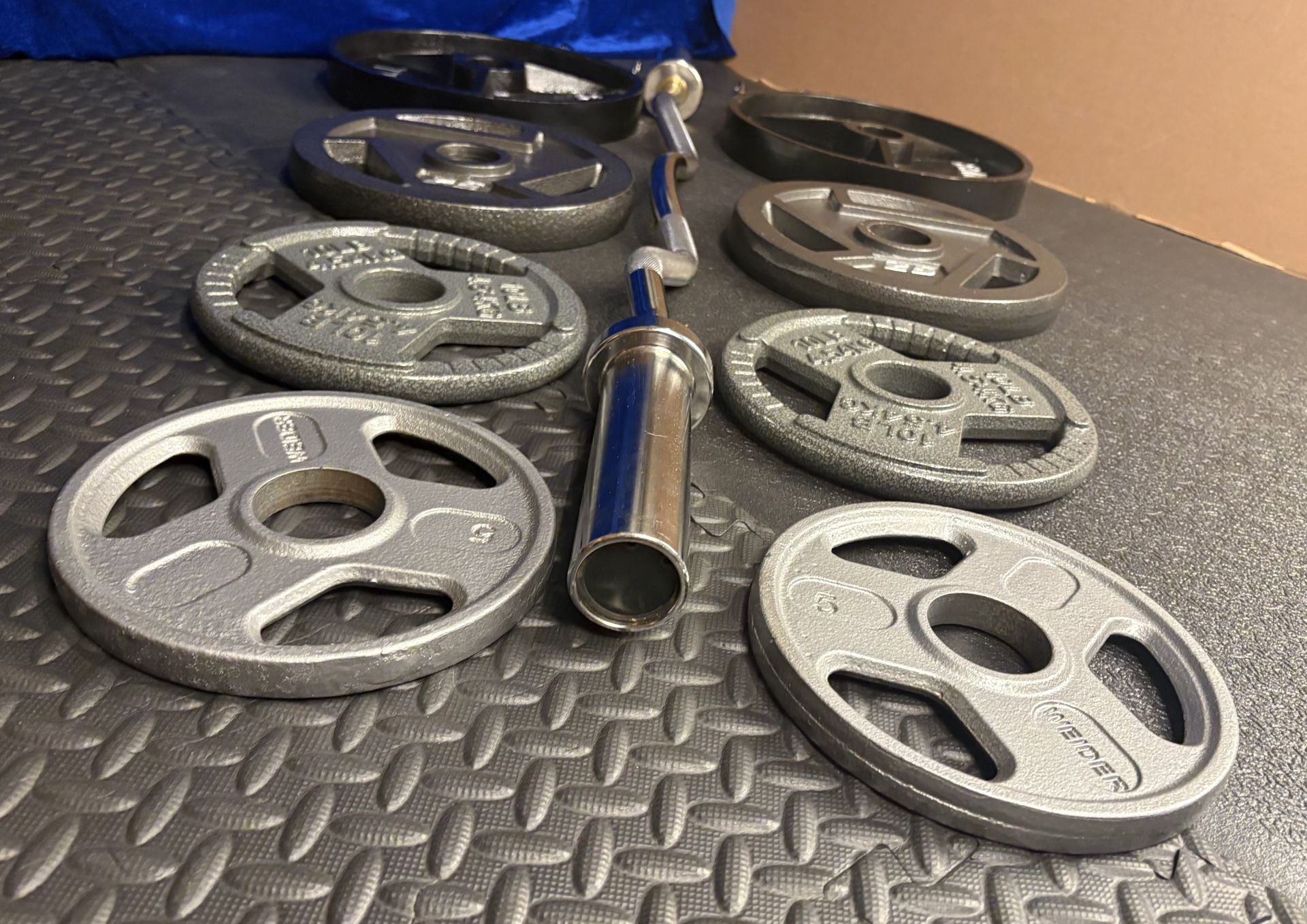 NEW Olympic Equipment Curl Bar of 20# with Cooper Bearings and Plates 2X35s, 2X25s, 2X10s and 2X5s pounds. Brute 170#