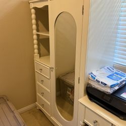 Elegant Crème Armoire with Mirror Door & Drawers – Originally $2,400, Asking $400