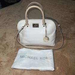  Auth-Michael Kors white patent leather hand bag ,with long strap .