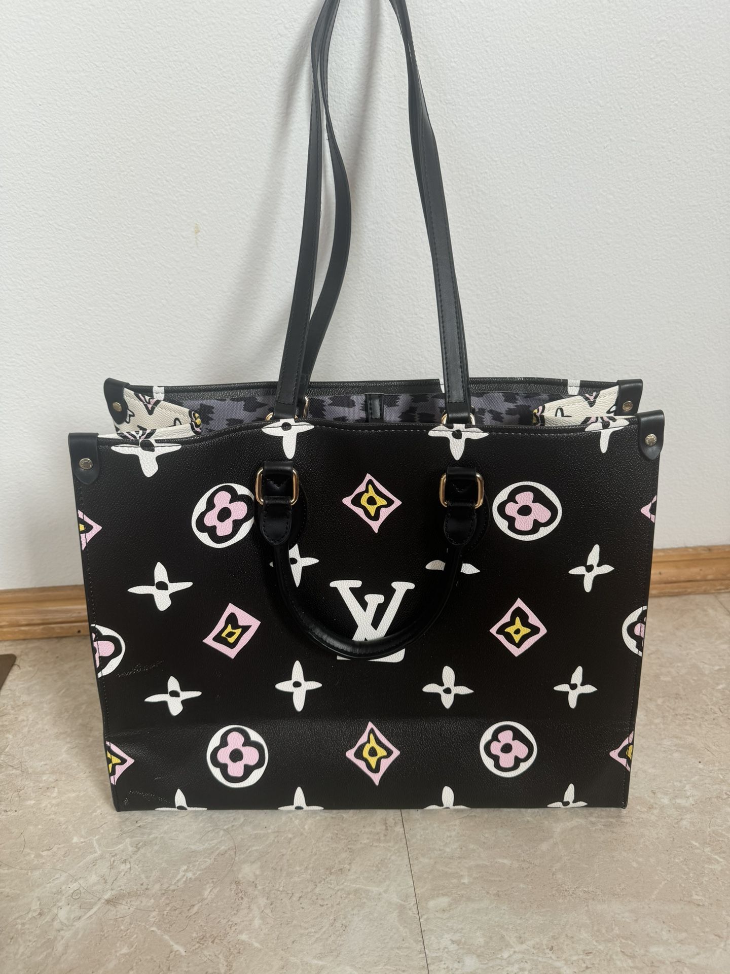 Louis Vuitton “On the go”Purse 