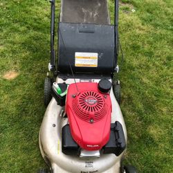 Honda lawn mower works great Bush Mower  good condition 