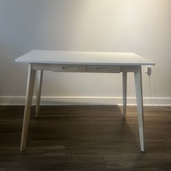 Rarely used White top wood legs writing/computer desk