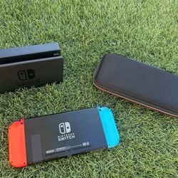 Nintendo Switch (with Accessories & Games)
