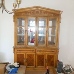Offering Two-piece Hutch With Glass Shelves And Mirror Backing