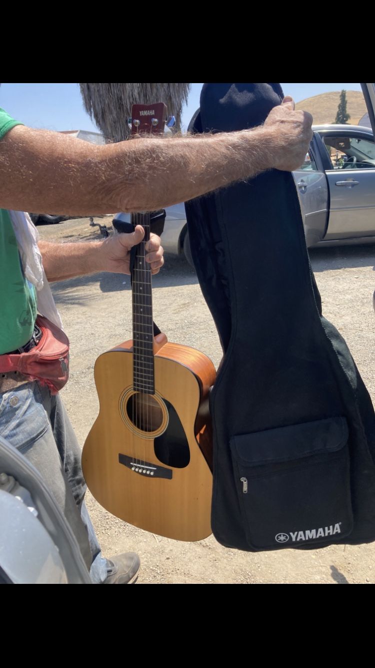 Yamaha acoustic guitar with case