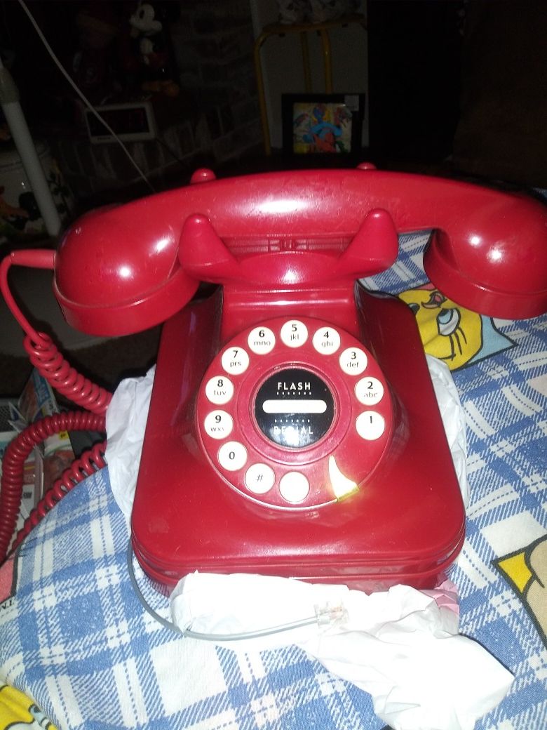 Red phone i use in room nite stand for decoration dont know if it works selling for 20.00