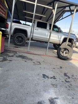 Wheels for sale 22x14 toyo open country tires 37s