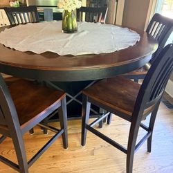 Counter height Kitchen and Chair set.  Table has built in Lazy Susan, wine and linen storage.